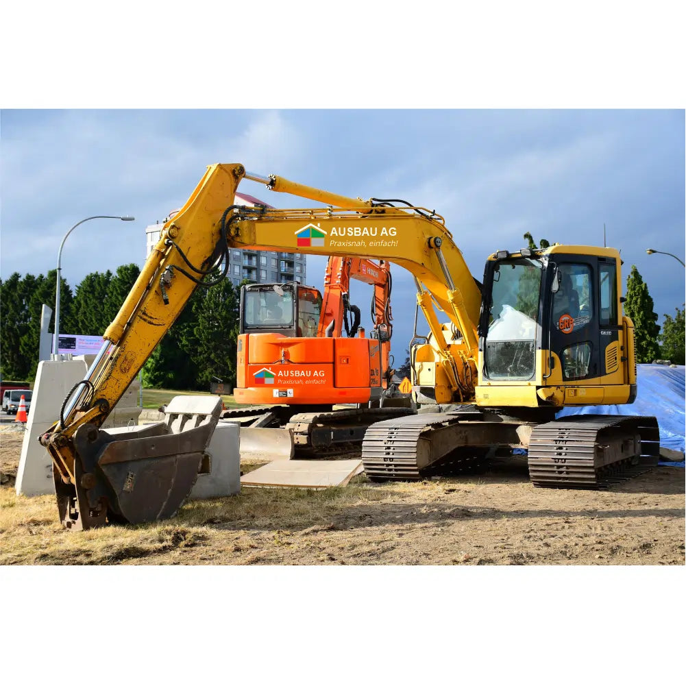 Beschriftung von Baumaschinen und Bagger mit farbigen Klebefolien in Minden